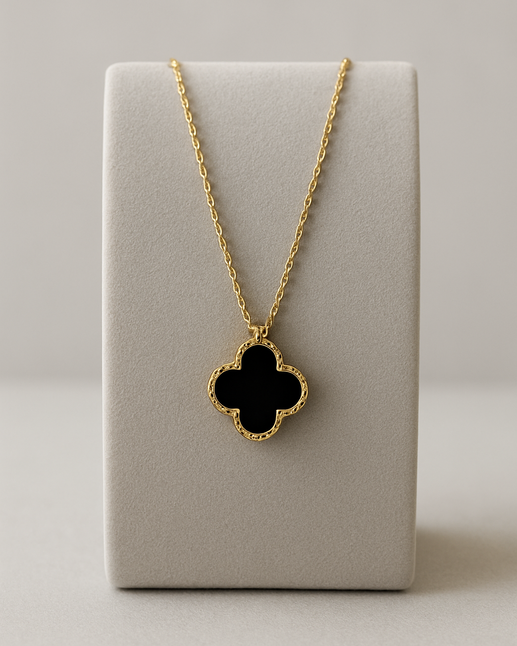 Elegant black clover pendant with gold beaded frame on fine gold chain